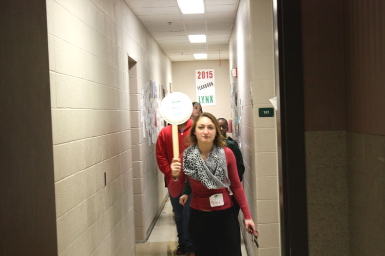 Junior Riley Almendinger leads a group of Fall Creek Valley eighth graders around the Lawrence North hallways. Students from the middle school visited many different classes at Lawrence North on Monday, Nov. 10 to better familiarize themselves for freshman year. 