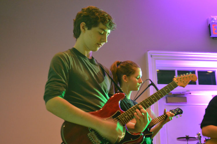  The Breadwinners’ freshman band members Keith Preston and Kathryn Auten play the guitar and ukulele, respectively, during their bands’ performance at Can Jam. Can Jam was a fundraising concert held on Jan. 16, led by Tri-Hi-Y, and offered an opportunity for student-led music groups to perform for an audience.