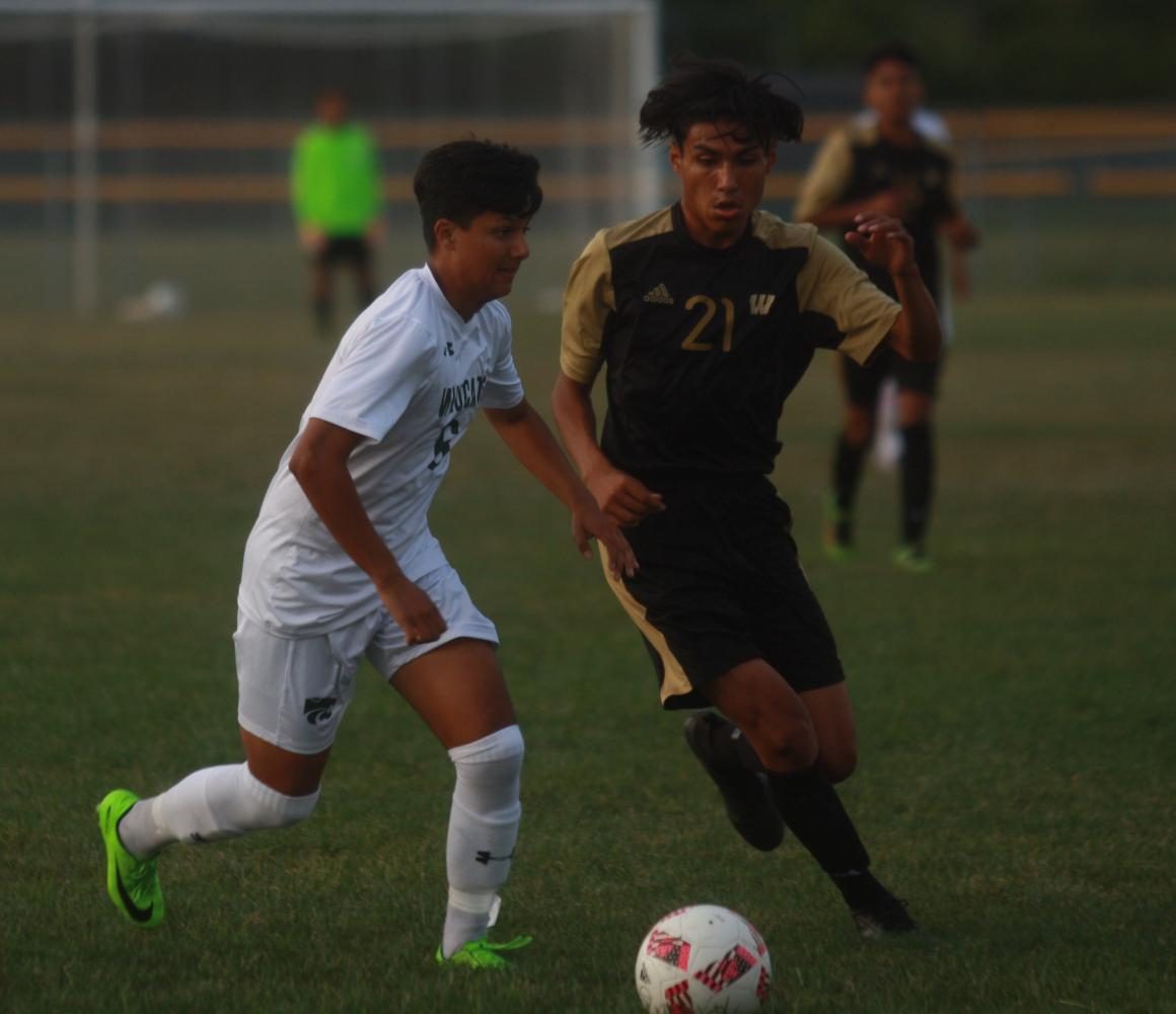 Warren Central comes back to draw Lawrence North in physical match: Photo Gallery