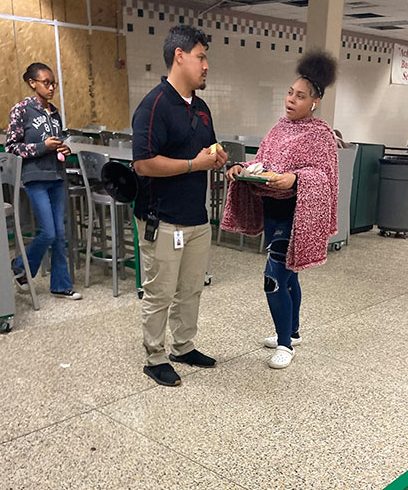 Attendance Dean JT Owens talks to a student during lunch block. Owens was named LN's Classified Employee of the Year for 2023. 